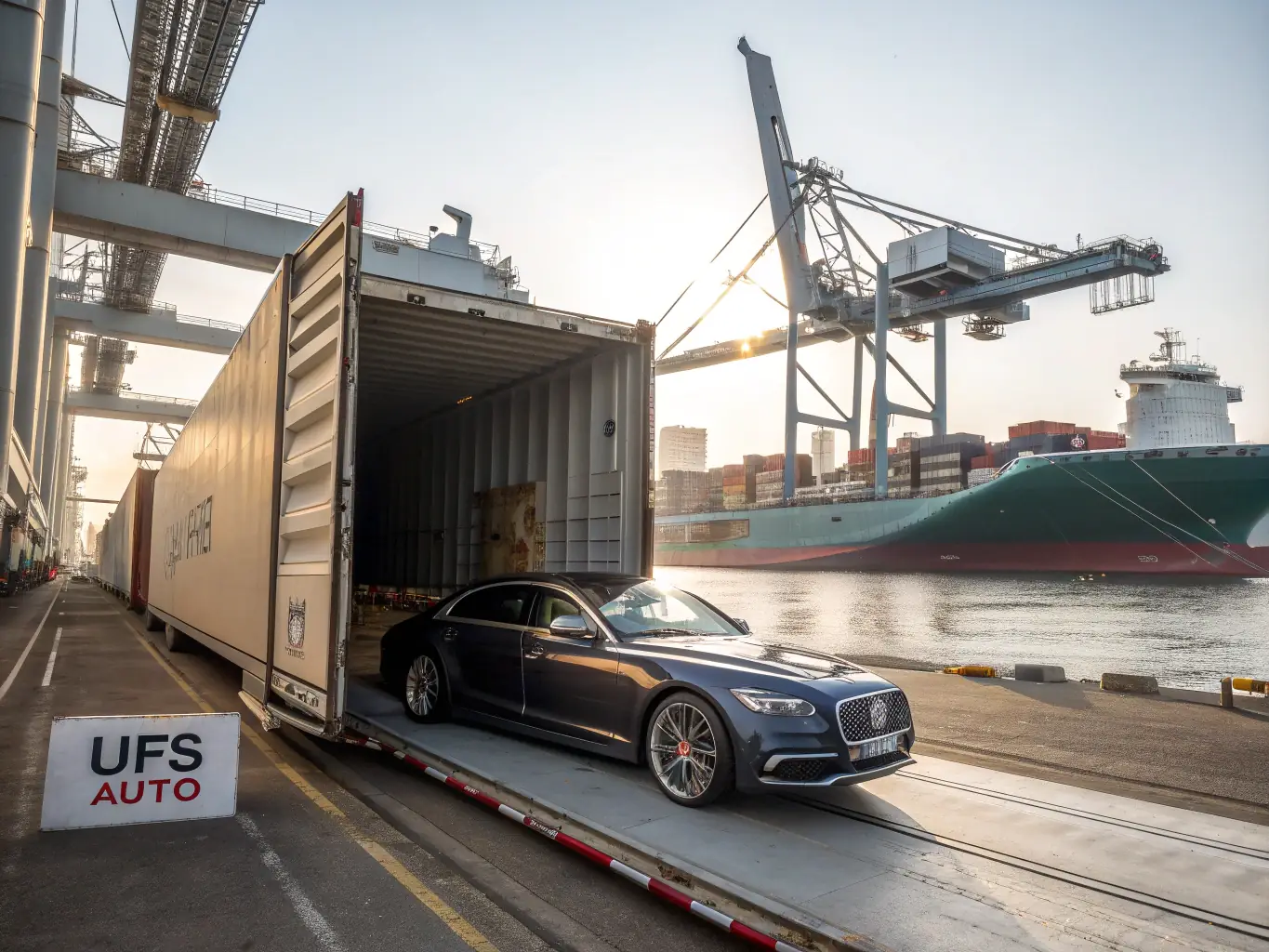 A high-quality photograph of a brand new car being carefully unloaded from a specialized transport truck, emphasizing the care and professionalism in Atlas Automotive Group's delivery services.
